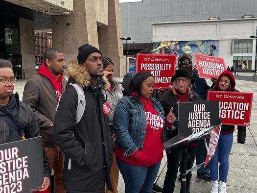 At a rally in Harlem, members of Citizen Action of New York call for a bevy of changes to public money in Albany. They want taxes raised on the wealthiest New Yorkers, to increase the state's minimum wage, and to end 'pay-for-play' by reducing state subsidies for corporations. (Citizen Action New York)