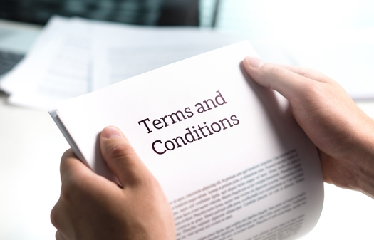 Consumer advocates say it's important for customers to read and understand a financial institution's terms and  conditions to know what services are available. (AdobeStock)