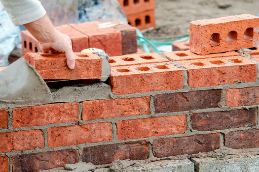 Native American advocates in Bismarck say new housing development is often built in communities separated from their populations, and a lot of infrastructure funding goes to improve those areas, leaving older neighborhoods to deteriorate. (Adobe Stock)