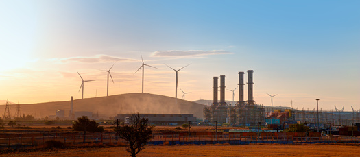 A new report finds the Regional Greenhouse Gas Initiative has created a 50% increase in economic growth per capita for the 12 states in it. However, experts worry it isn't as effective in helping communities living with the effects of power plant emissions. (Adobe Stock)