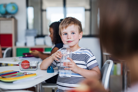 According to the American Heart Association, children in low-income households consume two and a half times more sugary drinks than their peers in higher-income households. (Adobe Stock)