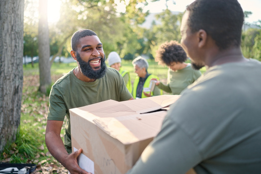 One of four Americans volunteers, and two of three Americans help their neighbor, according to a study performed by The Corporation for National and Community Service. (Adobe Stock)