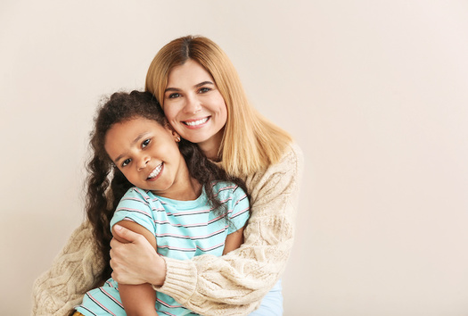 The 54,200 adoptions nationwide in 2021 represent a more than 6% decrease compared with 2020, and a more than 18% decrease from 2019's historic high of 66,200 adoptions, according to federal data. (Adobe Stock)