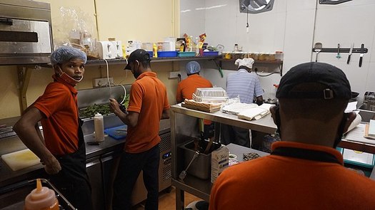 Banning noncompete agreements for workers could reduce racial and gender wage gaps, according to researchers. (Fredericknoronha/Wikimedia Commons)