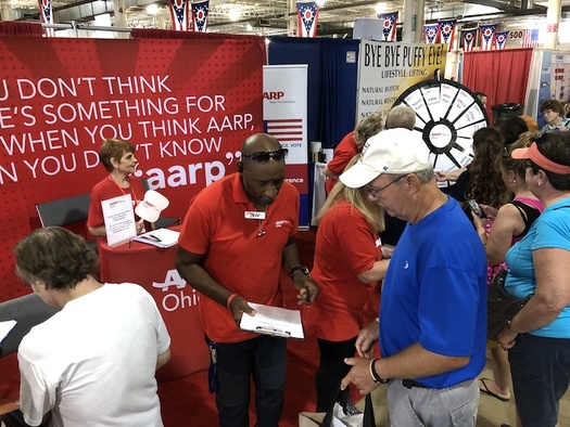 AARP volunteers at the Ohio State Fair. More than six out of 10 adults age 55 and older engage in some volunteer activity, according to The Urban Institute. (Adobe Stock)