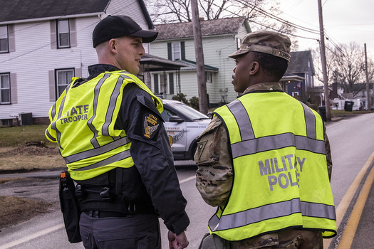 Ohio Army National Guard and Ohio State Highway Patrol officers assist with traffic control after the train derailment in East Palestine. (Flickr/Ohio National Guard)