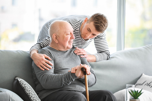 In a new AARP poll, 43% of respondents said they would be motivated to support political candidates who vow to expand access to family caregiver support and respite services. (Adobe Stock)