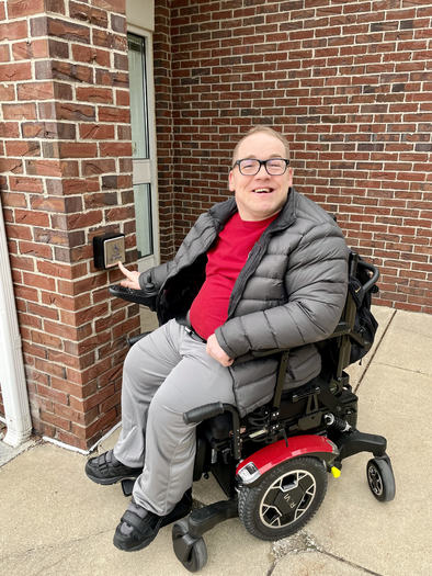 Robert Fisher of Adel, Iowa, prevailed in his efforts to have an electronic button installed to operate the door at the local U.S. Post Office. (Robert Fisher/Iowa Council on Developmental Disabilities)