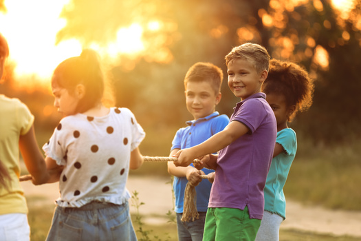 Teamwork, games, craft making and science projects create fun and learning activities for children. (Adobe stock)