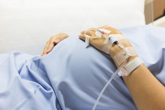 Beyond extending postnatal health coverage, some health leaders say improving paid-leave benefits can help address health complications that pregnant women can face, such as an elevated risk for stroke. (Adobe Stock)
