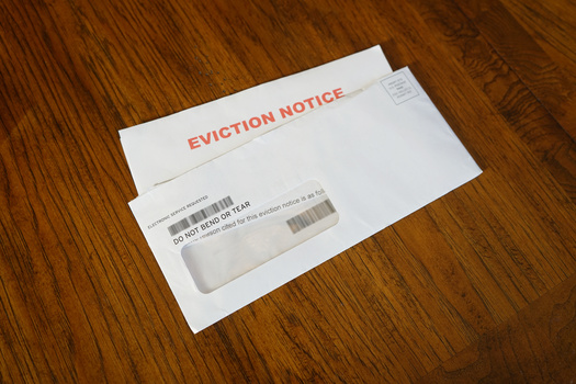 Evictions are traumatic experiences for families, and new project in King County, Washington, is providing support to prevent them. (Rick/Adobe Stock)