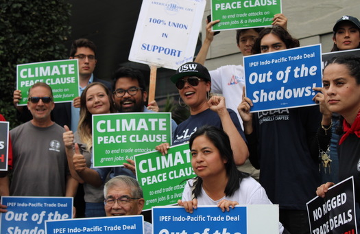 Advocates of a Climate Peace Clause protested outside trade negotiations in Los Angeles last year. (Will Wiltschko/Trade Justice Education Fund)