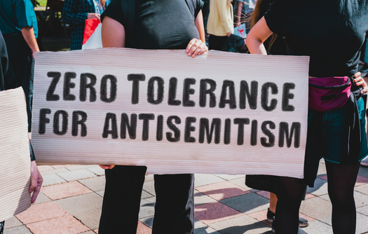 Experts find one factor driving antisemitism is social media. A report from the American Jewish Committee finds 82% of Americans saw some form of antisemitism on social media. (Adobe Stock)