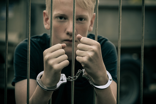 Young people who are adjudicated as delinquent may be placed in multiple types of facilities, from youth prisons and detention centers, to residential treatment facilities or group homes. (Jan H. Andersen/Adobe Stock)