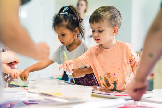 Staffing shortages at the Department of Social Services have led to parents seeking child care assistance being placed on hold for as long as two or three hours. (Adobe Stock)