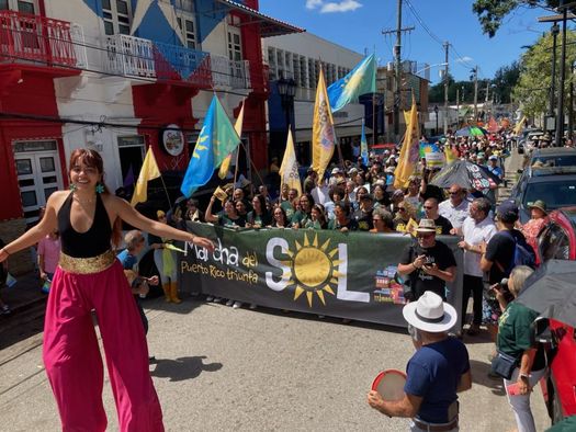 In March 2023, thousands lined the streets of Adjuntas for Casa Pueblo's second annual rally for solar energy. (Photo courtesy od Katherine Rapin)