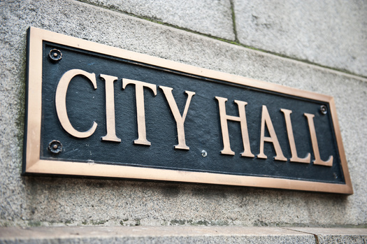 Wisconsin's more than 500 municipalities will share an additional $260 million in state aid over the next two years for priorities like police and fire protection and public works. (Adobe Stock)