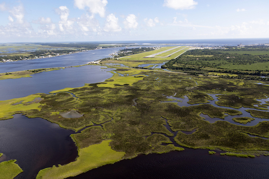An aerial view shows the salt marsh adjacent to the runway at Naval Station Mayport in Jacksonville, Florida. (Mark Bias) 