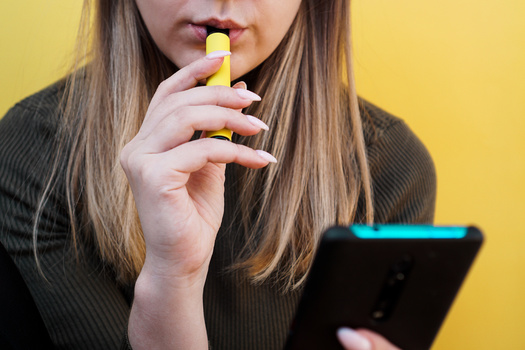 According to the Food and Drug Administration, more than 2.5 million high- and middle-school students currently use e-cigarettes, and almost 85% of them used flavored e-cigarettes. (Adobe Stock)