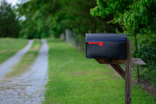 The U.S. Postal Service delivers more mail than any of its counterparts around the world, serving nearly 165 million addresses in the country, and covering every state, city and town. (Adobe Stock) 