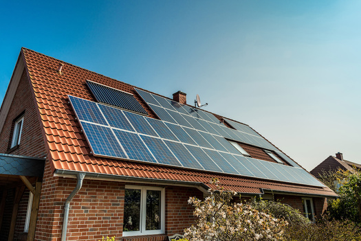 Aggressive door-to-door solar sales tactics are a telltale sign of a solar scam, according to Solar United Neighbors. (Adobe Stock)