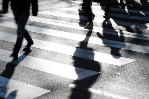 The number of pedestrian deaths in Iowa fell by nearly 44%, from 32 to 18 between 2021 and 2022, according to the Governor's Highway Safety Association. The state has directed funds to 10 locales to focus on making conditions safer for pedestrians. (Adobe Stock)