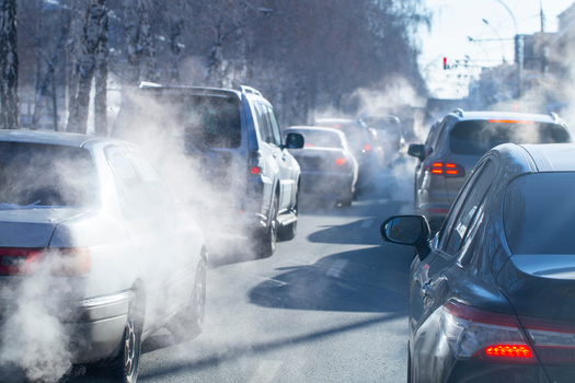 The proposed standards would provide important benefits to communities near major roadways, where people of color and people with low income are disproportionately exposed to air pollution from vehicles. (Nady/AdobeStock)