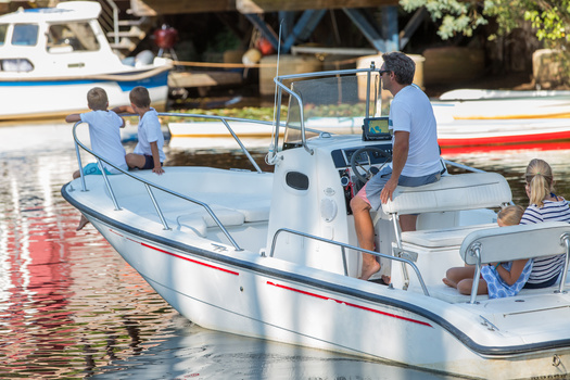 Minnesota Department of Natural Resources officials say the pandemic helped fuel a renewed interest in boating activity across the state. There is also concern about the growing size of watercraft and how larger waves affect swimmers and other non-boating water recreation. (Adobe Stock).