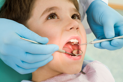 Health equity groups said dental therapists can go out into settings like schools and federally qualified community health centers, and provided much-needed oral health care to underserved populations. (Adobe Stock)