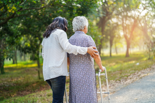 Care provided by millions of unpaid family caregivers across the United States was valued at $600 billion in 2021, a $130 billion increase in unpaid contributions since 2019, according to AARP. (Adobe Stock)