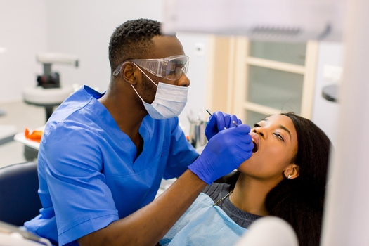 The costs of employing a dental therapist are about a third to a half that of a dentist, making hiring them an affordable way to treat more low-income and uninsured patients, according to the National Partnership for Dental Therapy. (Adobe Stock)
