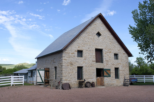 The historic stone barn at the Stephen George Homestead is made of limestone with visible seashell and other fossils. (Sheridan Community Land Trust Staff).