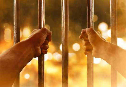 Rising temperatures and heat waves are having severe effects on incarcerated people's physical and mental health. A Prison Policy Initiative report found suicides increased by 23% in the three days following days of extreme heat. (Adobe Stock)