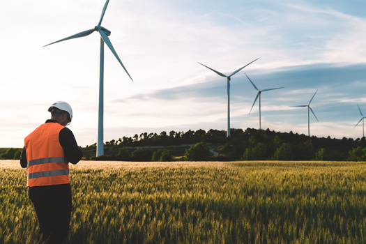 Technicians are crucial to keeping renewable wind energy solutions sustainable as they install, inspect and maintain the colossal turbines, which can cost anywhere from $2 million to $4 million each. (Adobe Stock)
