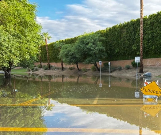 Flood waters blocked the only road into two schools in La Quinta, Calif., on Monday, forcing them to close. (Kristen Wood)