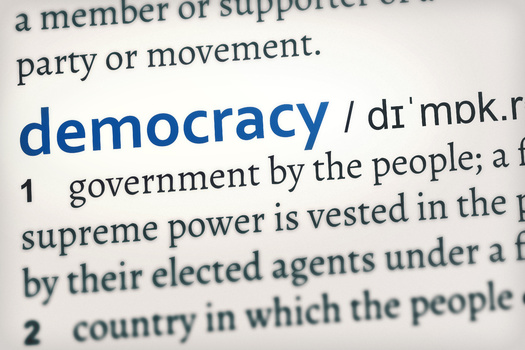 After false claims of fraud in the 2020 presidential vote, some states have lowered their risk of threats to democracy by enacting certain safeguards. A new analysis found Wisconsin faces a 'moderate risk' of election denialism. (Adobe Stock)