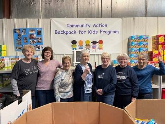 Organizers with the Backpacks for Kids Program in the Bismarck area help ensure kids have access to food when they're away from school during the academic year, so they do not return to class distracted by hunger. (Photo courtesy of Community Action Program)