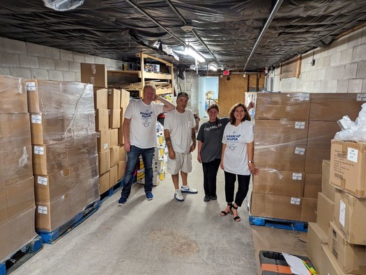 The Massachusetts community action agency Citizens for Citizens prepares to distribute the first shipment of diapers and other necessary supplies to low-income families through the federal government's first diaper distribution pilot program. (MASSCAP)