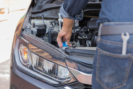 Cars under a federal safety recall with unrepaired defects are often listed for sale online, with a notice hidden on a secondary page warning that some cars may have unrepaired safety recalls. (Montira/Adobestock)