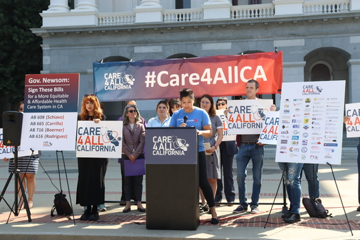 The Care4All campaign held a rally this week on the Capitol Steps in Sacramento, urging Governor Newsom to sign a package of bills. (Kit Bear/Health Access)