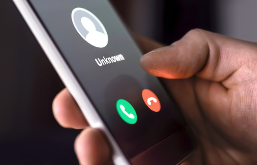 To avoid scams, people are advised not to share personal information with unknown callers. (terovesalainen/Adobe Stock)