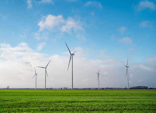 Projects like wind farms have mostly enjoyed broad public support, but researchers with Columbia Law School's Sabin Center for Climate Change Law say local opposition to renewable energy facilities is widespread, potentially hindering the achievement of climate goals. (Adobe Stock)