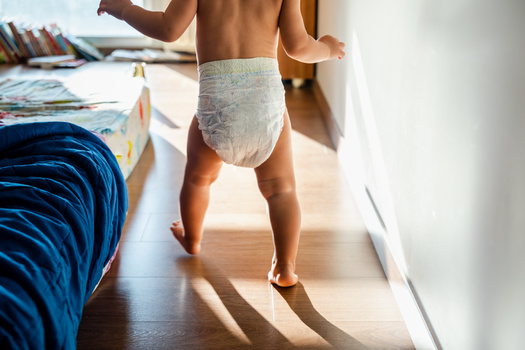 Nationally, 25% of parents with diaper need reported they have missed an average of five days of work or school in the past month due to not having enough diapers to drop children off at child care. (Joaquin Corbalan / Adobe Stock) 