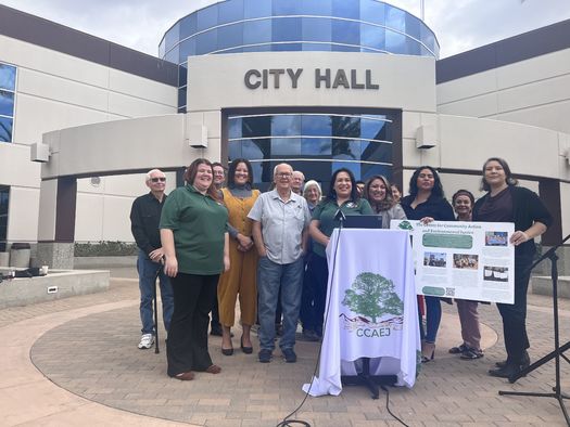 Advocates gathered at a Monday news conference in Moreno Valley, Calif., to highlight a court ruling against a large warehouse proposal. (Joycelyn Sida)
