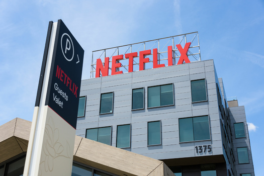 Many of the companies lobbying for tax breaks have paid very little in taxes. Netflix, for example, has paid federal corporate income taxes equal to less than 1% of its reported profits over four years. (Adobe Stock)