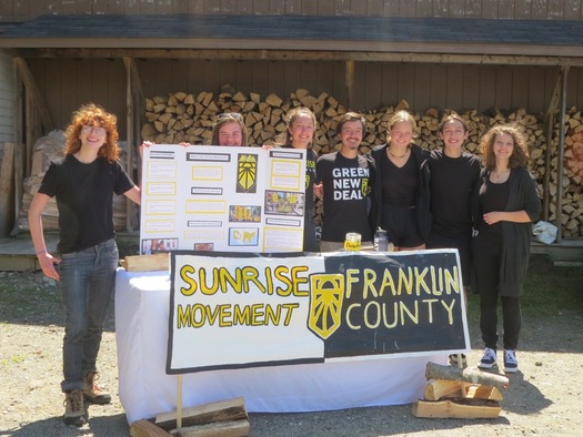 Members of the Sunrise Movement in Franklin County, Maine, advocate for a Green New Deal. The Fifth National Climate Assessment showed greenhouse gas emissions in the United States fell 12% from 2005 to 2019 but will need to decrease 6% annually to meet international climate goals. 