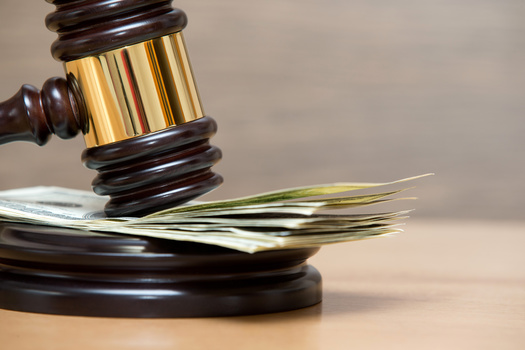 Congress is considering a bill to ease the tax burden on consumers who win a judgment in fraud cases. (Pakhnyushchyy/Adobe Stock)