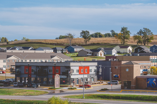 Commercial buildings in Winnebago, Neb., including headquarters of award-winning Ho-Chunk Village, and Ho-Chunk Village residential housing in background.  (Sam Burrish/Ho-Chunk, Inc.)