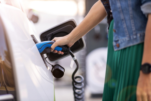 According to the Union of Concerned Scientists, driving an electric vehicle in Georgia produces 2.3 metric tons of emissions per year, compared with 4.9 metric tons from the average new gasoline-powered car. (Adobe Stock) 
