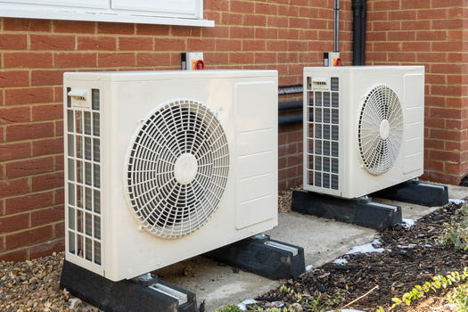 Heat pumps, powered by electricity, are seen as a key source in eventually replacing natural gas to reduce emissions from homes and businesses. (Adobe Stock)
